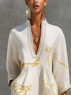 Renata - Short lace dress with golden print and deep V-neck