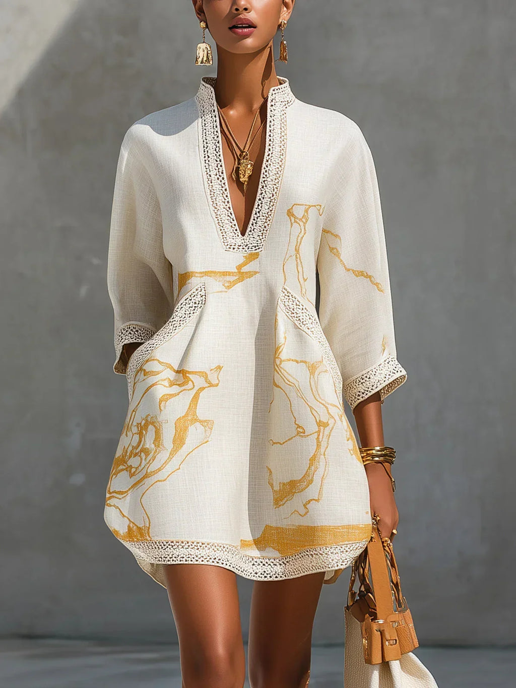 Renata - Short lace dress with golden print and deep V-neck