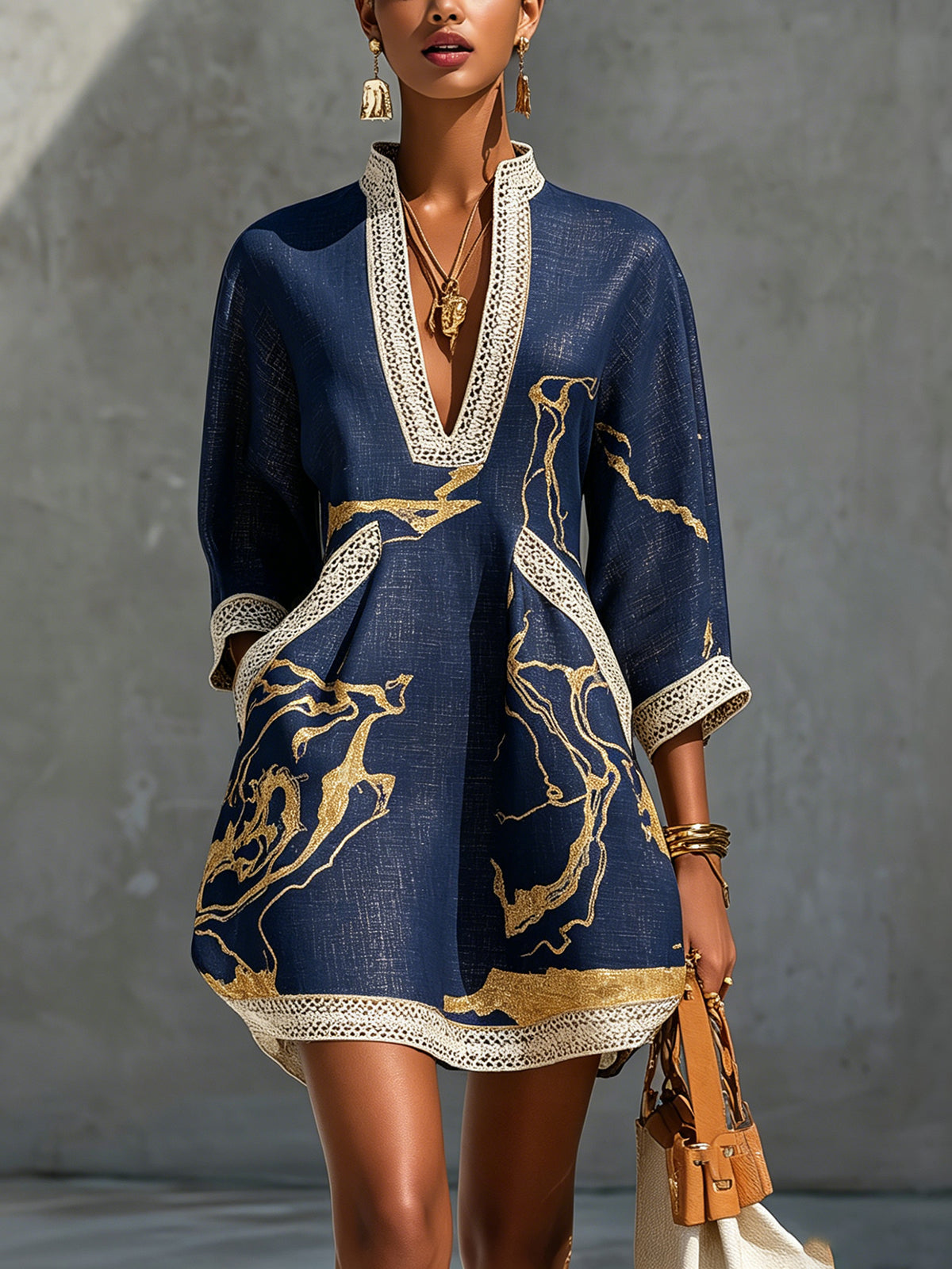 Renata - Short lace dress with golden print and deep V-neck