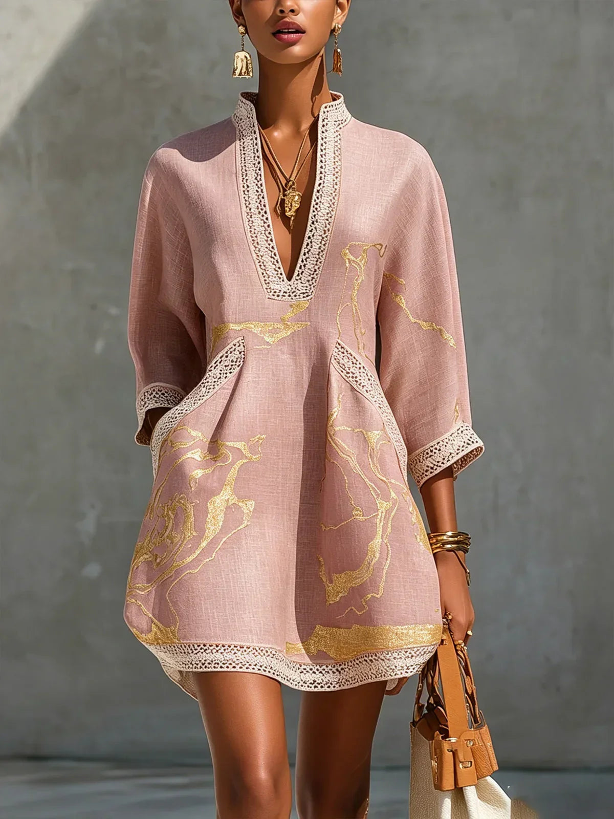 Renata - Short lace dress with golden print and deep V-neck