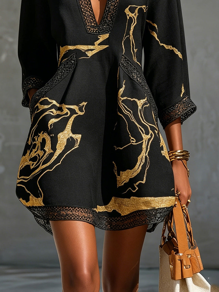 Donatella - Black mini dress with golden marble print and crochet lace