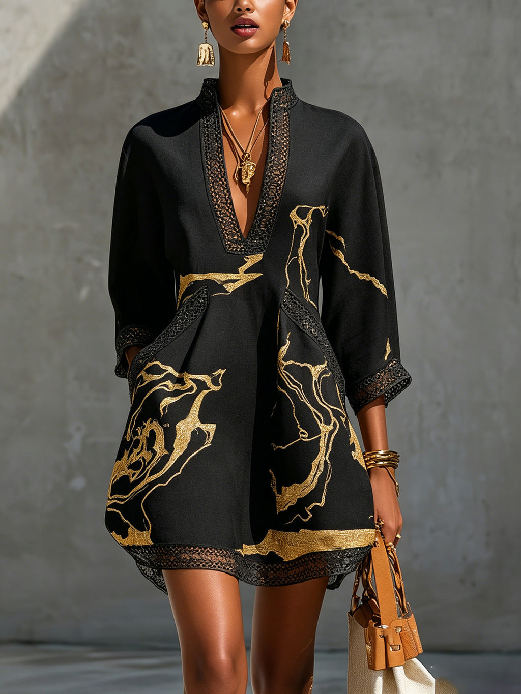 Donatella - Black mini dress with golden marble print and crochet lace