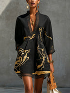 Donatella - Black mini dress with golden marble print and crochet lace