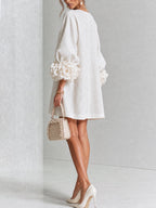White Mini Dress with Flower Buttons and Extravagant Flower Sleeves