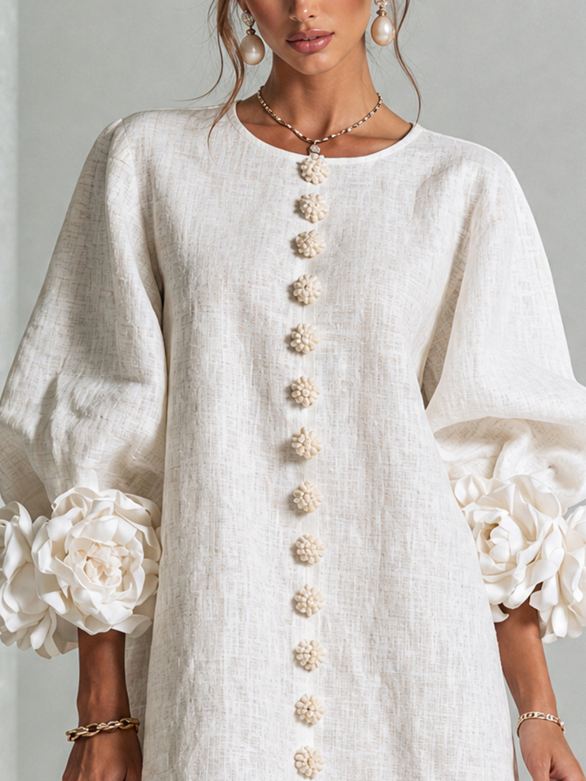 White Mini Dress with Flower Buttons and Extravagant Flower Sleeves